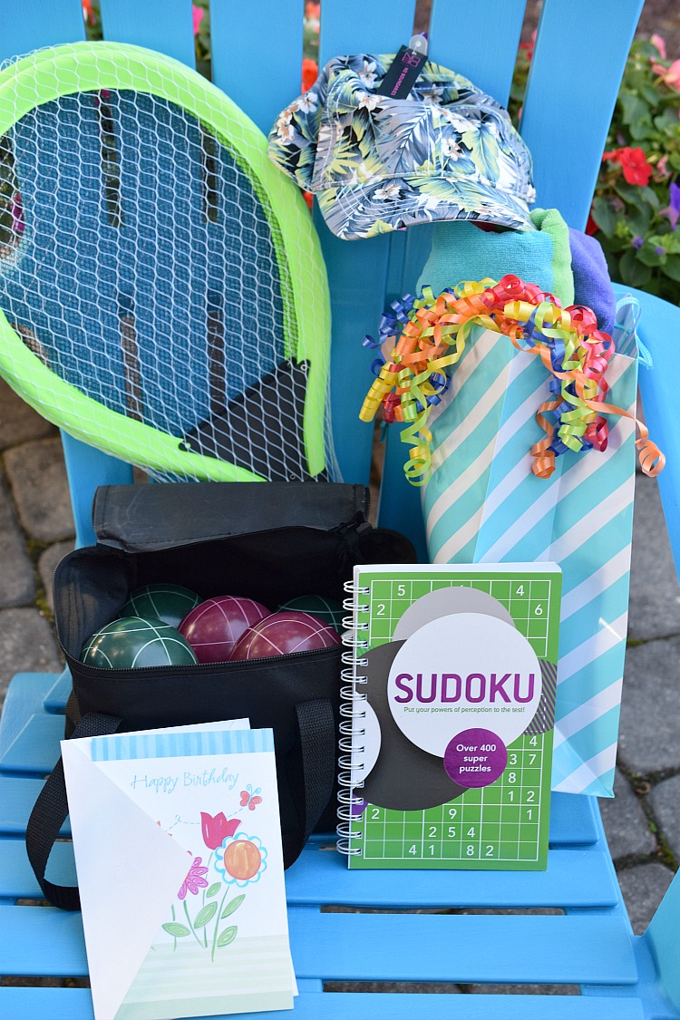 An Adirondack chair with some items for summer fun is a good idea for a summer birthday gift