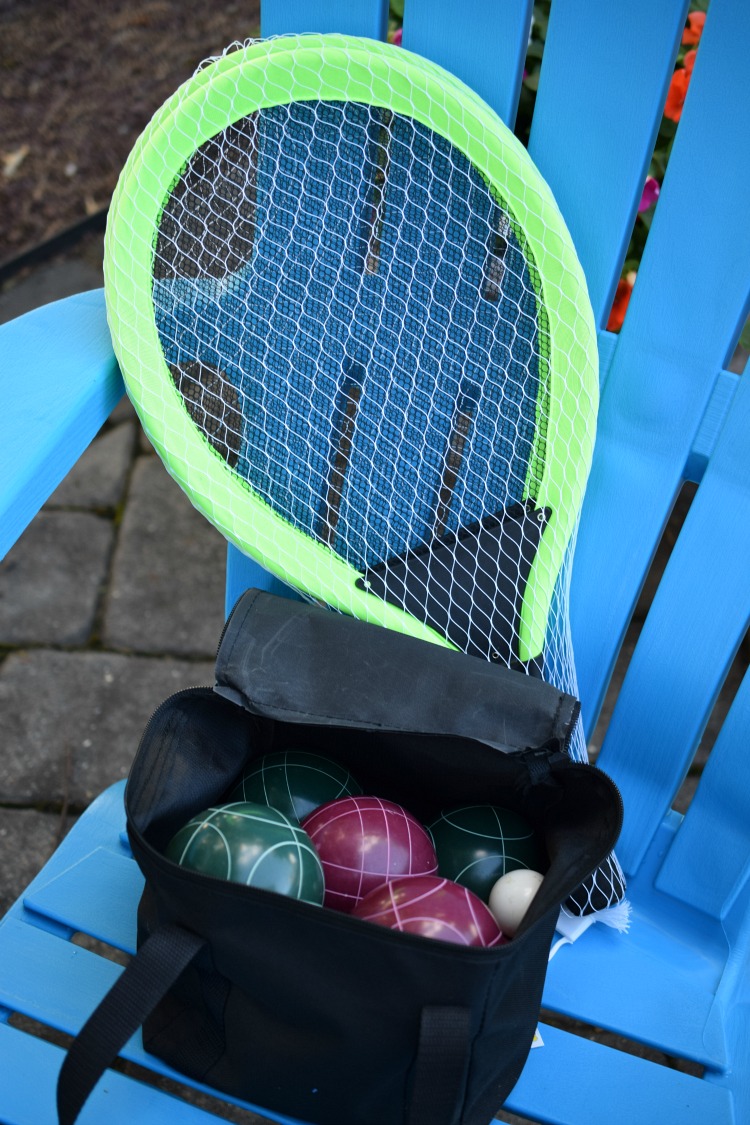 A lawn tennis set and a bocce ball set are fun summer gift ideas