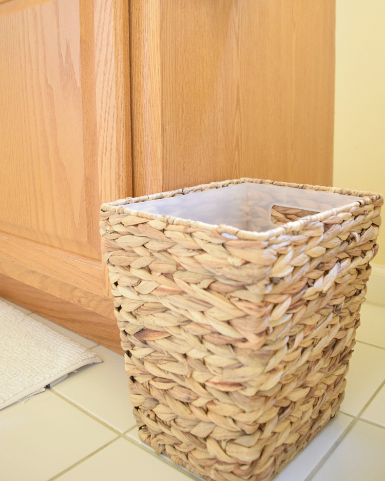 A stylish weaved wastebasket made from water hyacinth
