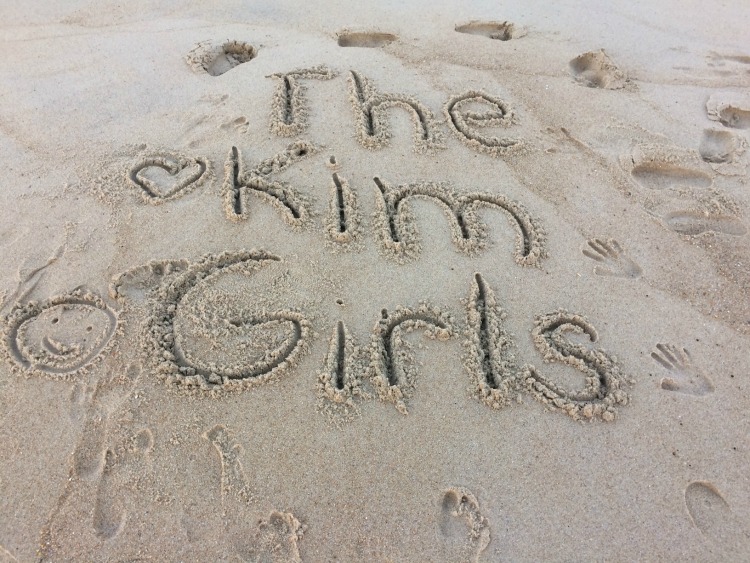 writing in the sand on the beach