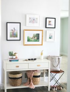 I love this stylish entryway and mud room area by Sandy a La Mode