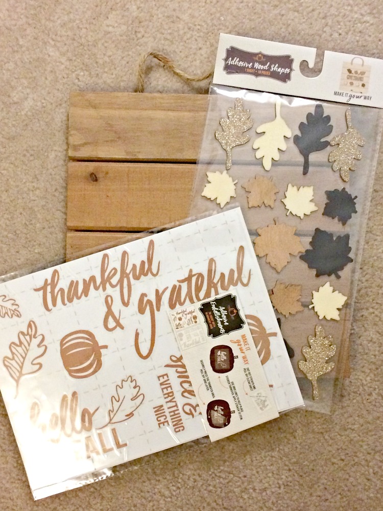Supplies for an easy DIY pallet-style wood sign from Target's dollar spot