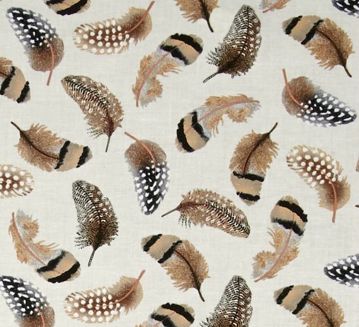 This brown, white and black feather-themed fabric would make great throw pillows for my living room sofa.