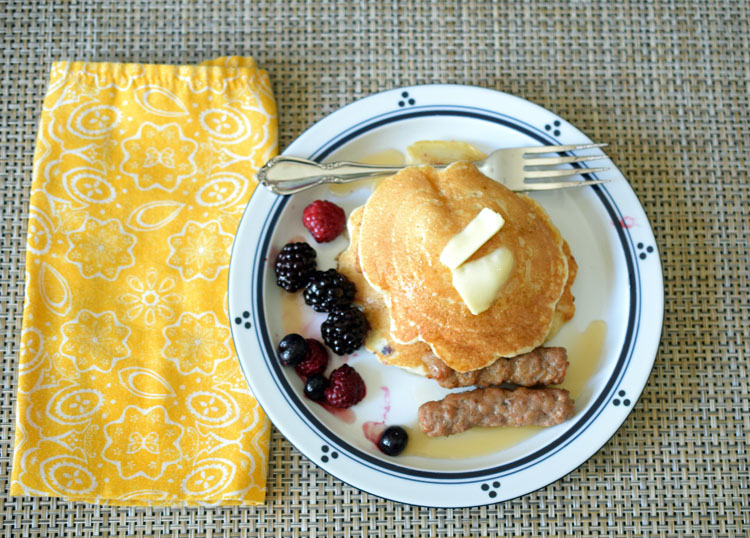 Krusteaz buttermilk pancakes with fruit and sausage