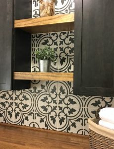 Laundry room with graphic tile, dark cabinets and butcher block