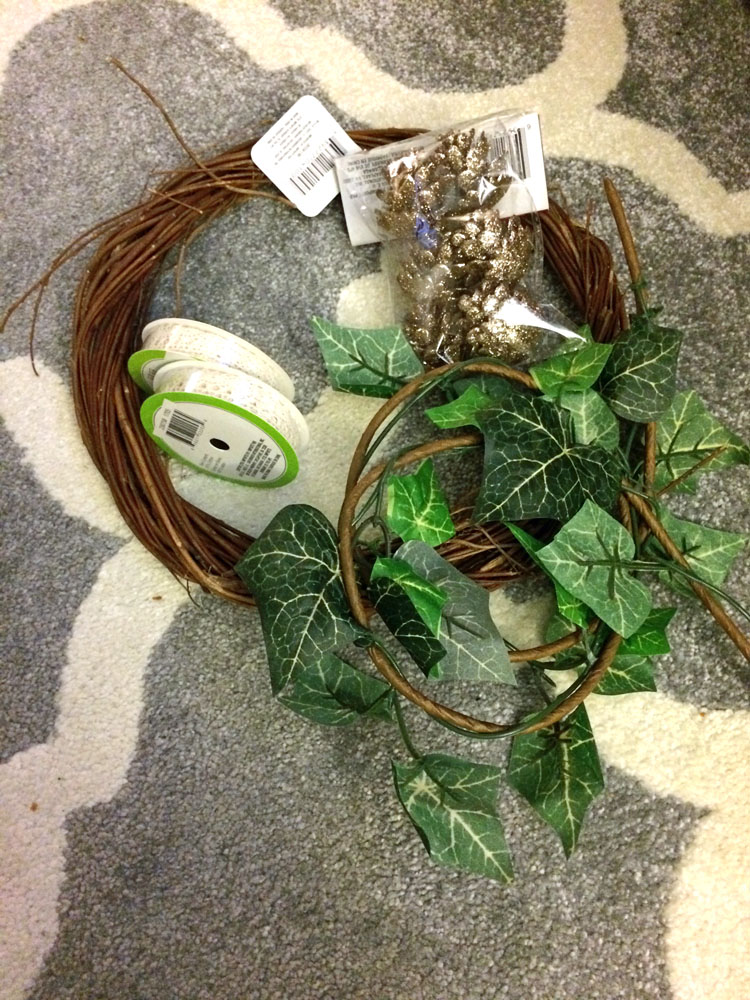 Supplies for an ivy and lace boho wreath for the winter and Christmas holidays