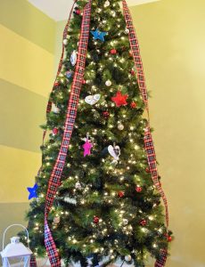 pre-lit artificial pine christmas tree by Treetopia