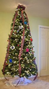 Treetopia Christmas tree decorated with plaid ribbon and homemade fabric ornaments