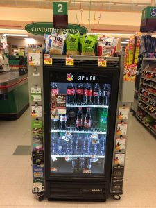 A fridge of cold Coca-Colas to go at Stop & Shop