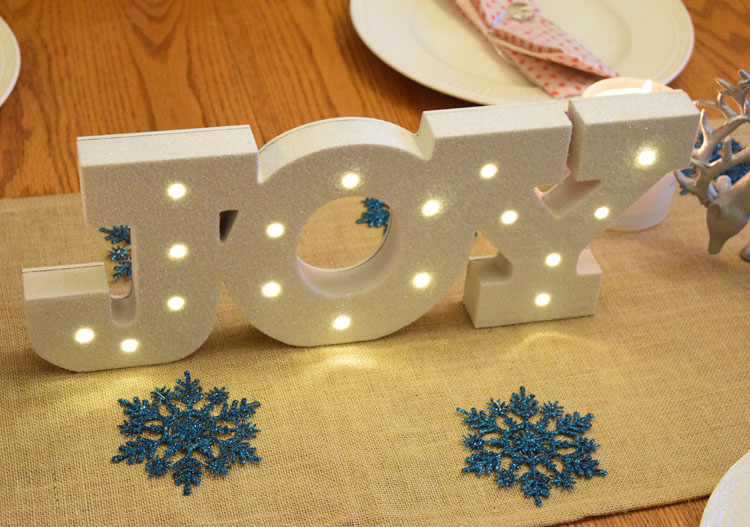 lighted Joy marquee sign for Christmas and the holiday season