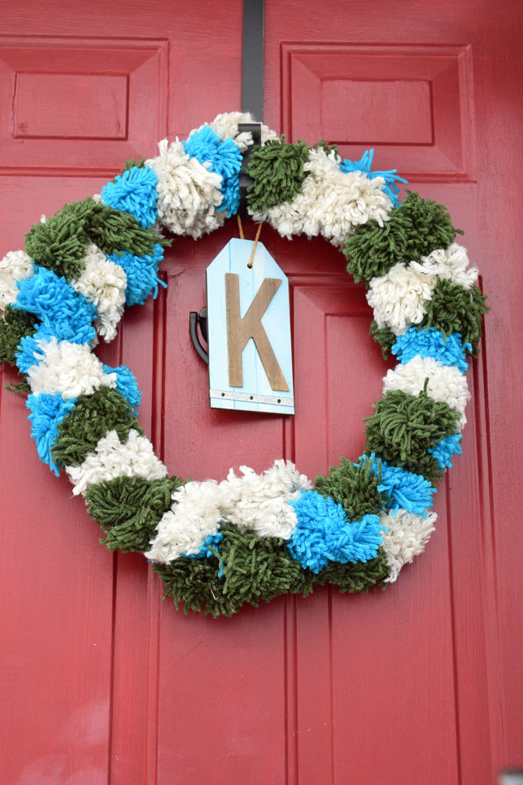 DIY Red and Green Pom-Pom Christmas Wreath - Design Improvised