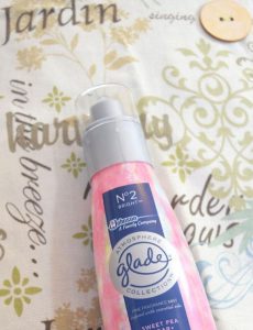 updating a room for spring with the fresh scent of Glade Atmosphere room spray