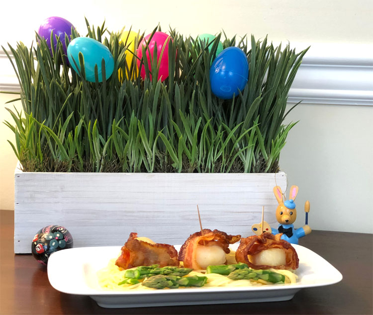 An Easter grass and Easter egg centerpiece, and a delicious Easter appetizer -- fresh scallops wrapped in bacon