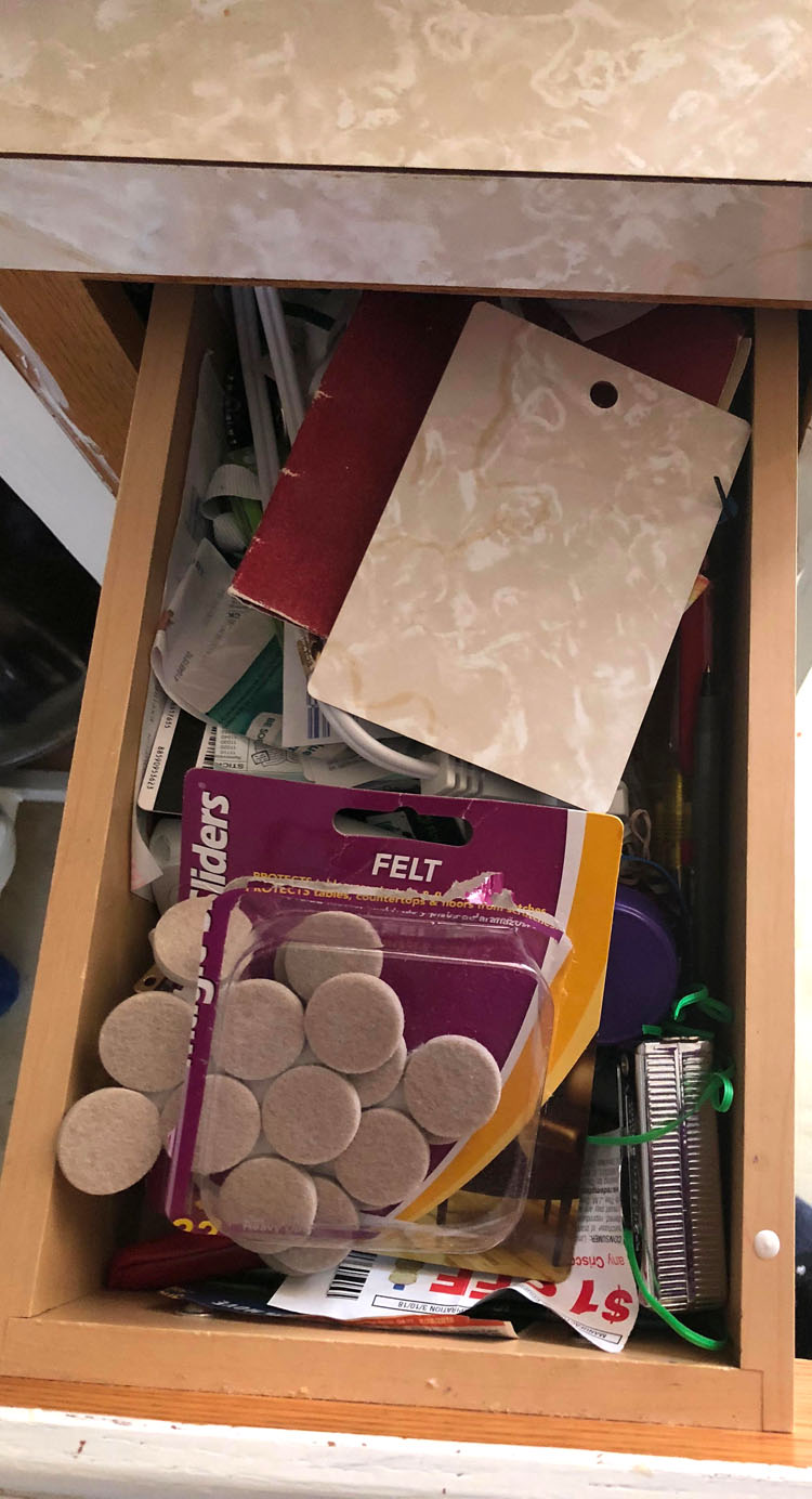 unorganized junk drawer