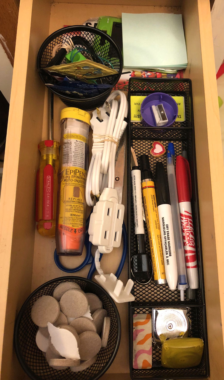 an organized kitchen junk drawer