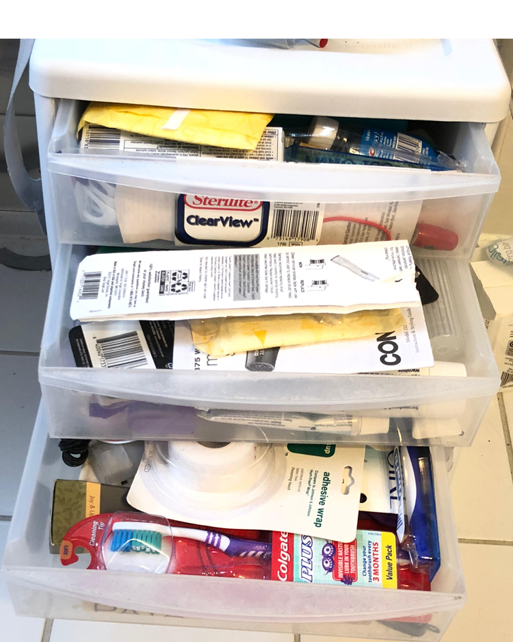 messy and disorganized bathroom drawers
