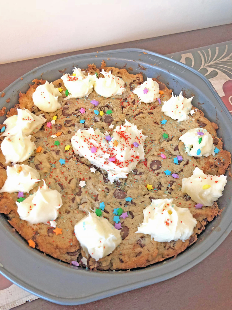 a homemade chocolate chip cookie cake made from a recipe