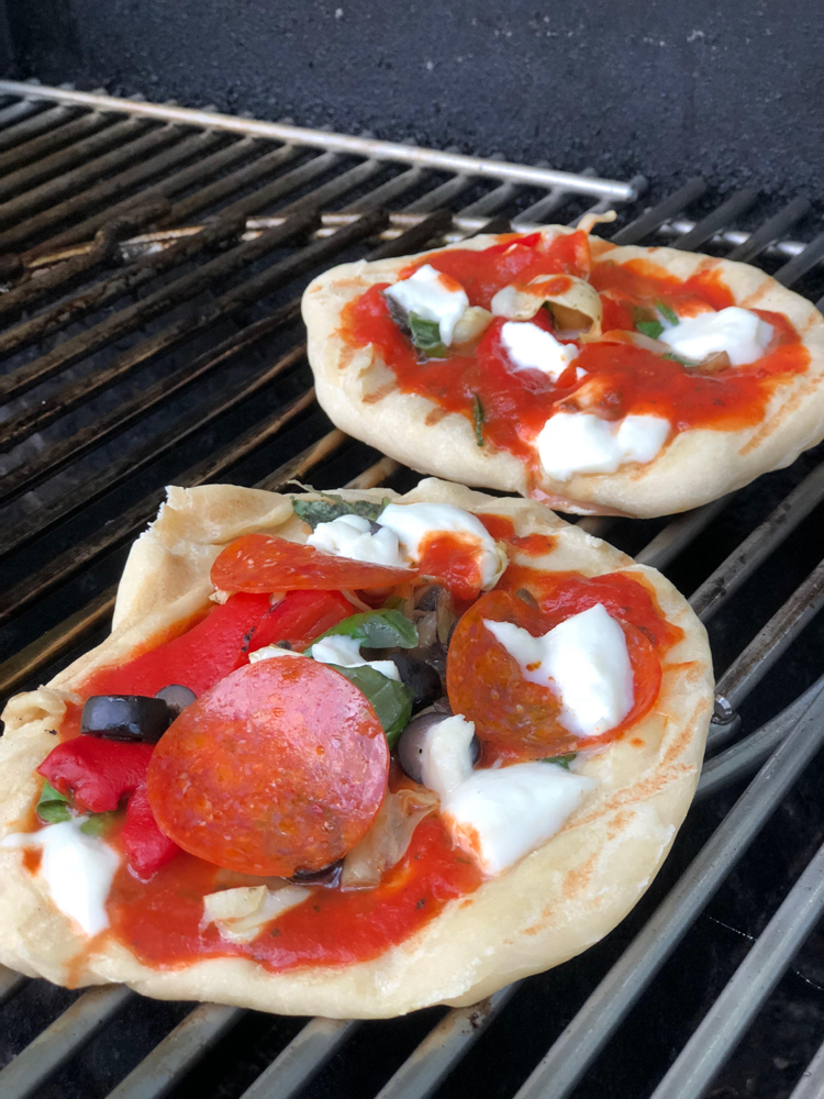 Easy and delicious recipe for grilled personal pizzas on the grill