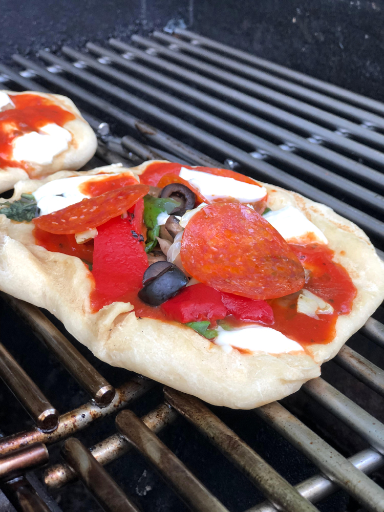 Easy and delicious recipe for grilled personal pizzas on the grill