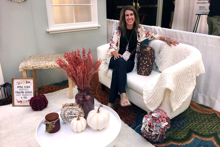 blogger Carrie of Curly Crafty Mom at Joann's booth at the Haven blogging conference in Charleston, S.C. in July 2018