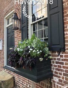 Brick home in Charleston, S.C., with a gas light