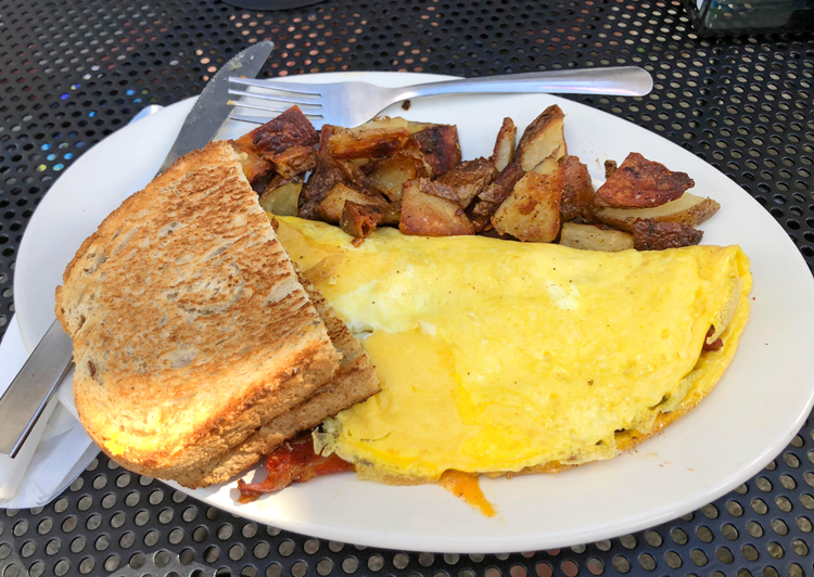 cooked ice cream parlor omelette and breakfast potatoes