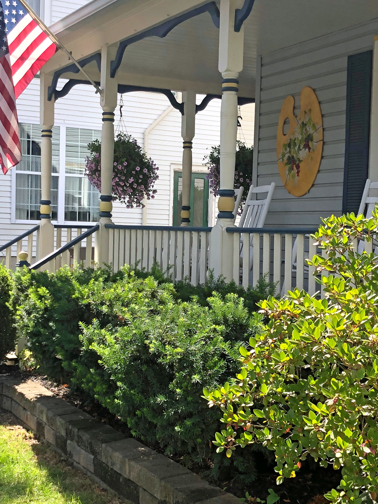 front porch on an adorable home in hammondsport, new york