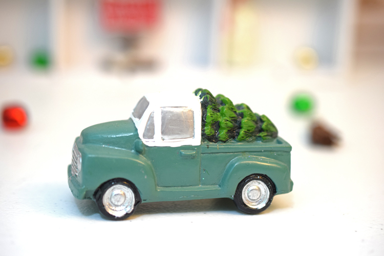 Miniature green pickup truck with Christmas tree from Target. #christmasdecor #target #christmas