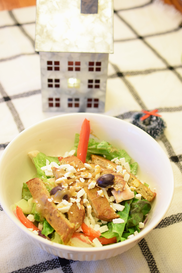 Serve your family and delicious vegetarian meal by making this delicious green salad with Morningstar Falafel Burgers and homemade tahini dressing