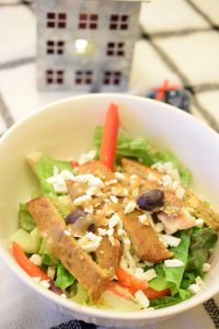 Serve your family and delicious vegetarian meal by making this delicious green salad with Morningstar Falafel Burgers and homemade tahini dressing