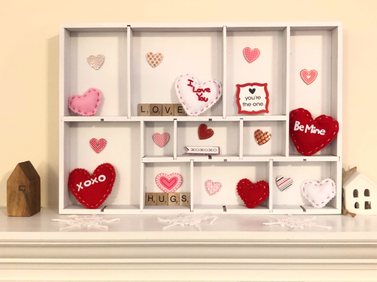 A DIY Valentine's Day display. box made from a spray painted drawer organizer