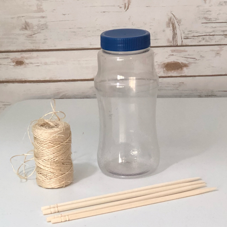 A few inexpensive supplies are all you need to make a plastic bottle bird feeder