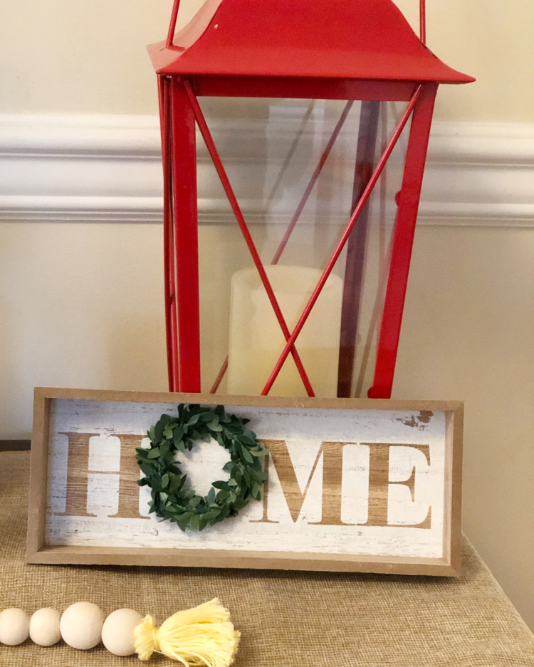 beaded garland, sweet home sign and a red lantern