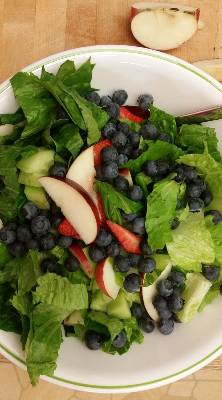 Delicious salad with blueberries and apples