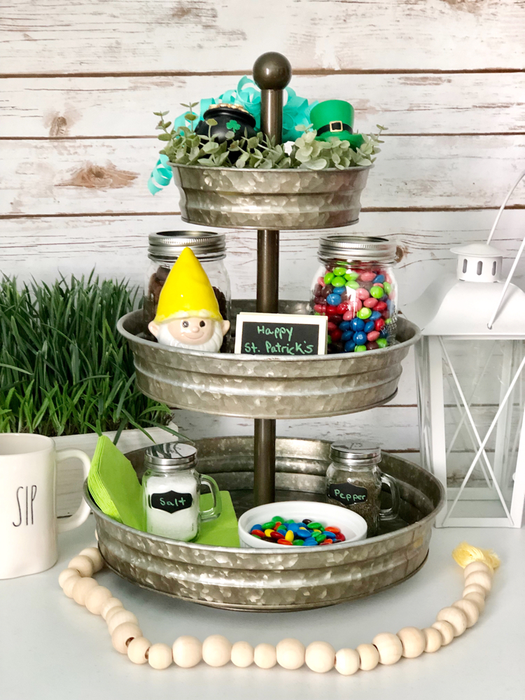 I love how this farmhouse-style galvanized tiered tray has been decorated for St. Patrick's Day.
