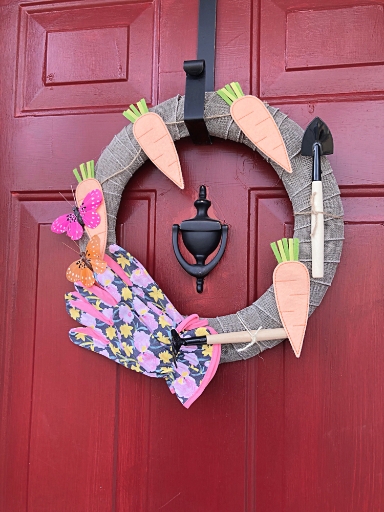 This spring gardening wreath is easy to make and can be made with supplies from the dollar store