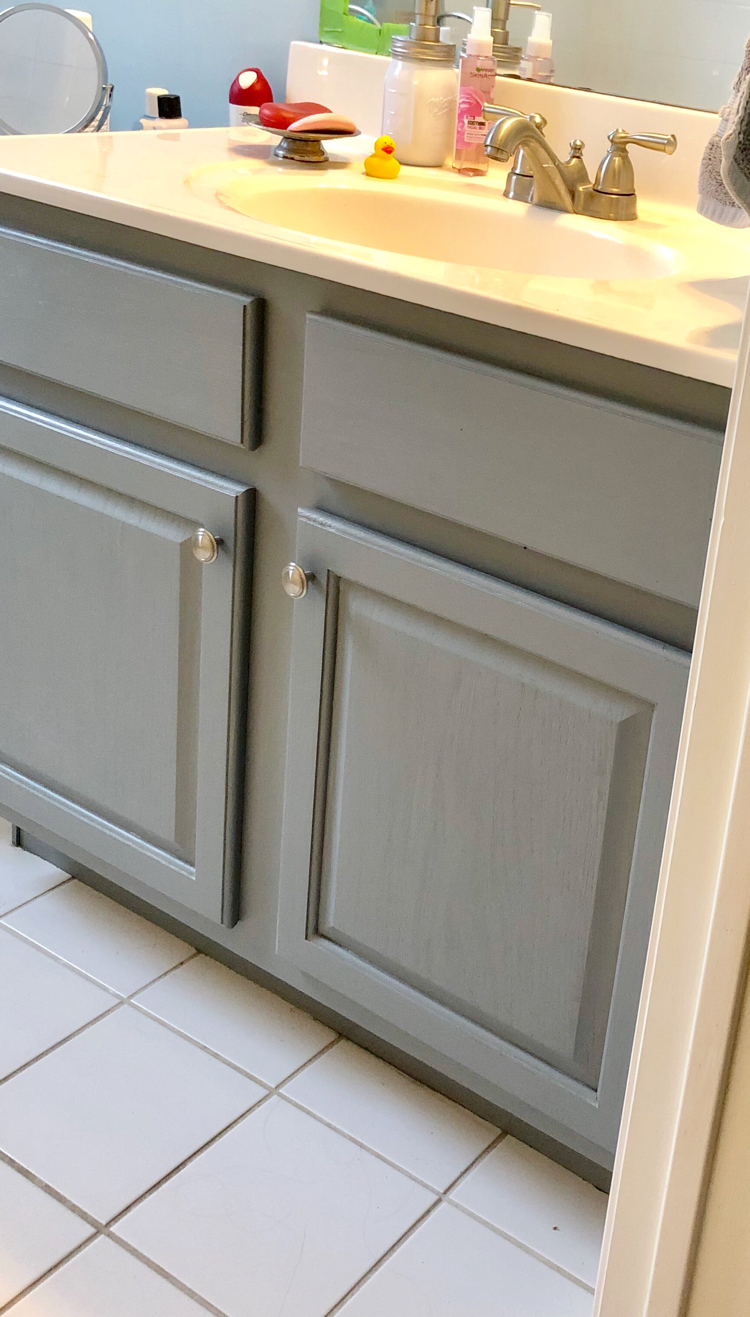 Satin Enamels paint by Americana Decor is a durable and easy way to paint a bathroom cabinet.
