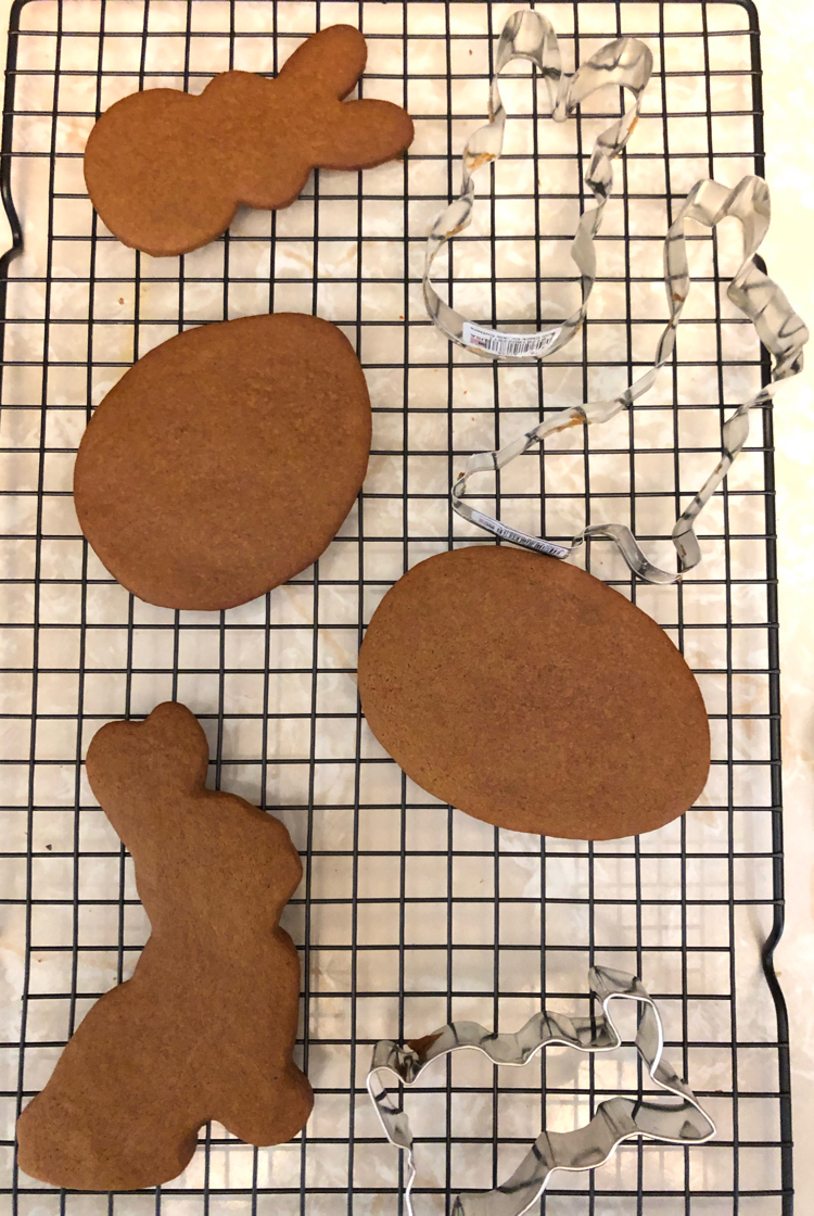 Cooling Easter gingerbread cookies on wire cooling racks