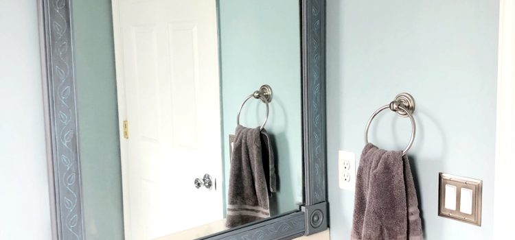 How to make an easy DIY frame for a builder grade bathroom mirror