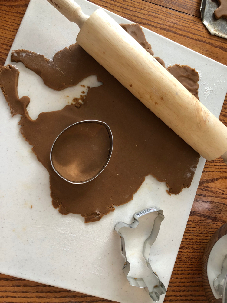Rolling out gingerbread for Easter cookies