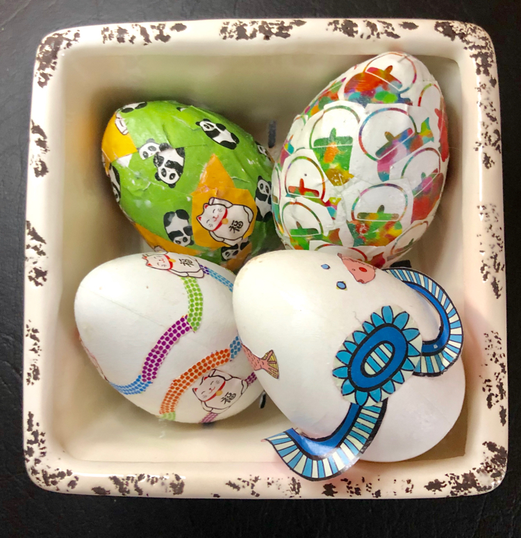 It's fun to decorate craft Easter eggs with Mod Podge and origami paper.