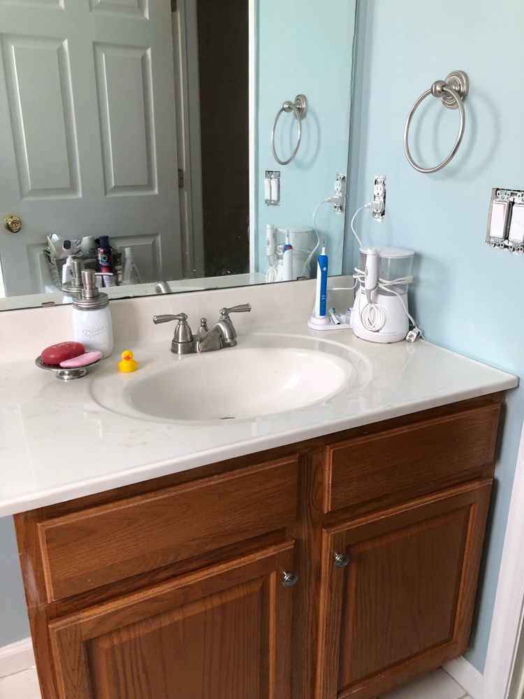 A bathroom painted in Yarmouth Blue by Benjamin Moore