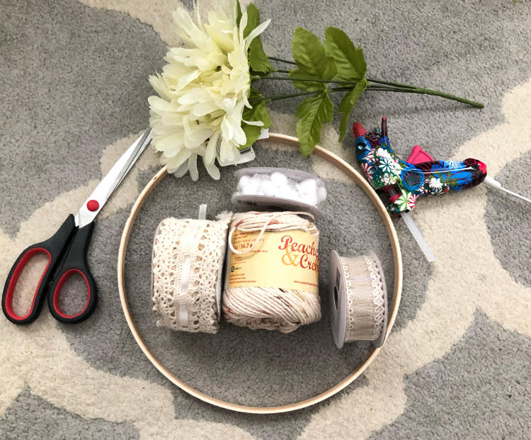 supplies for making a simple dream catcher from an embroidery hoop