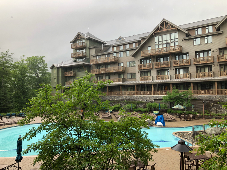 View of the pool from the balcony of our one-bedroom suite at The Lodge at Spruce Peak in Stowe, Vt.