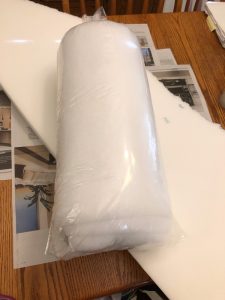 When making a cushion, it's best to wrap the foam in batting b before inserting into its case.