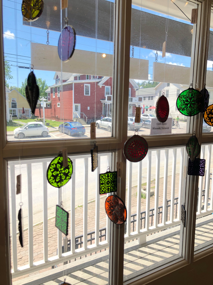 Decorative stained glass hangings in a Stowe, Vermont, crafts store