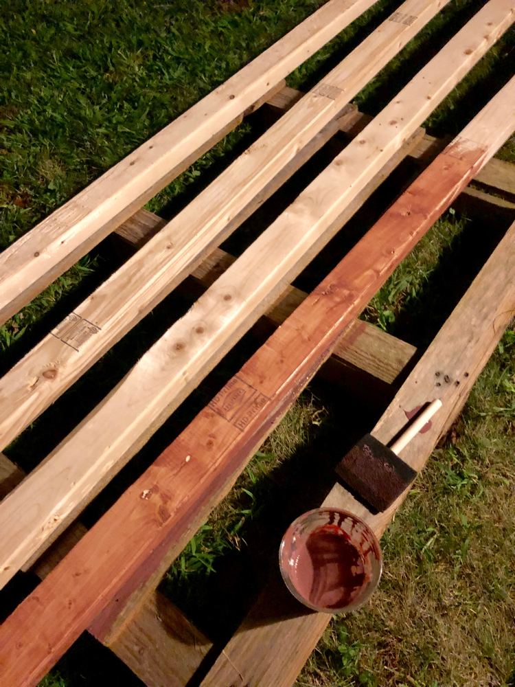 staining DIY string light poles