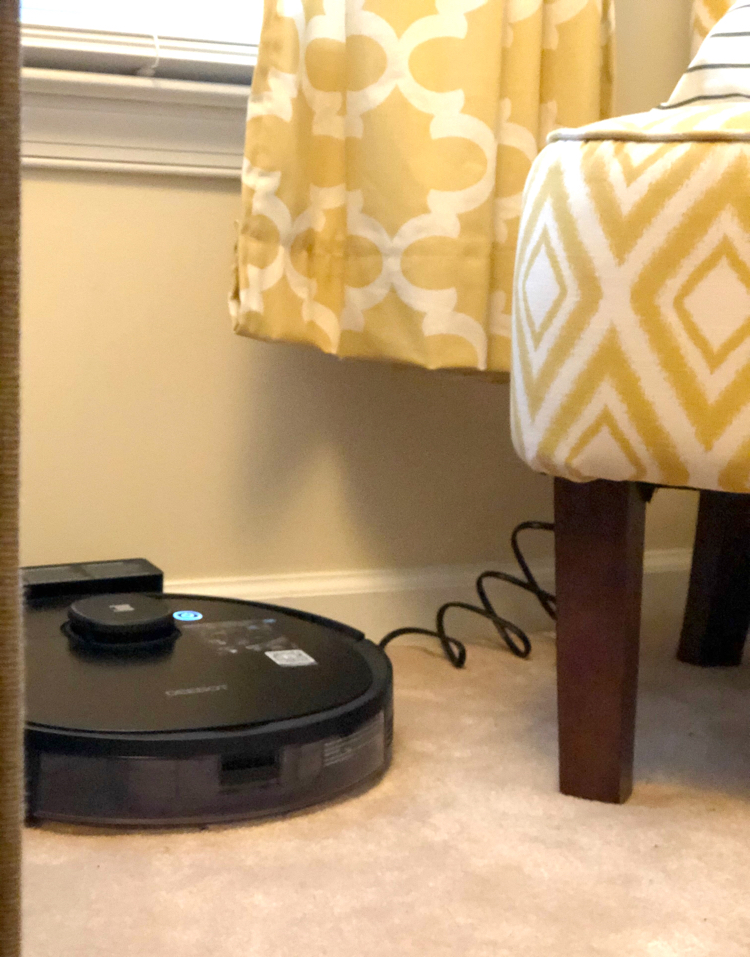 The charging port for the Ecovacs Deebot Ozmo 950 robotic vacuum allows for easy charging between cleanings.