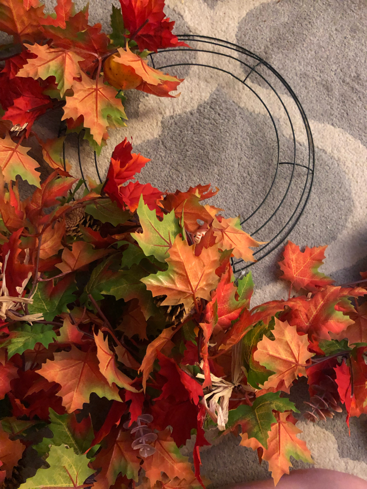 Some fall garlands and a metal wreath form are all that's needed to make a beautiful and easy fall wreath.