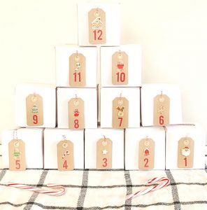 A cute and simple Christmas advent calendar made out of inexpensive gift boxes.